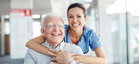 A patient getting a hug by his provider