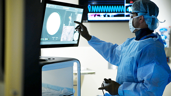 Doctor performing Robotic Assisted Bronchoscopy