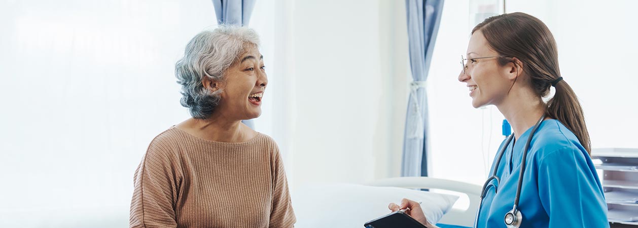 Smiling nurse and patient