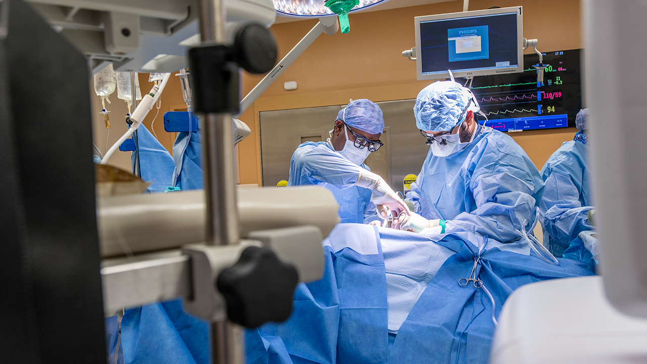 Dr. Kwame S. Amankwah, Chief of Vascular and Endovascular Surgery, performing a bypass surgery in the operating room