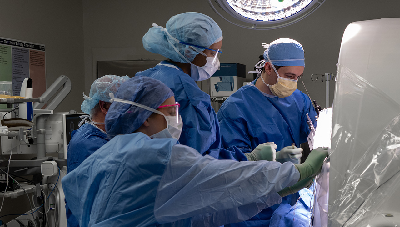 Dr. Ketan Bulsara operating on a patient in the operating room